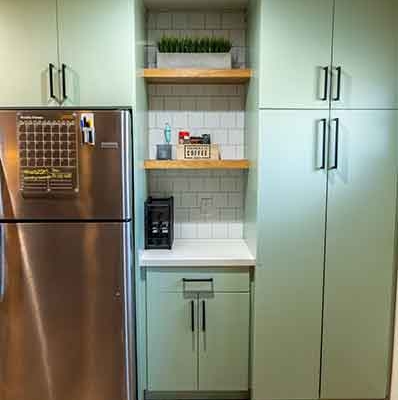Sage Green ADU Kitchen Cabinets with Coffee Station and Stainless Steel Refrigerator Sage Green ADU Kitchen Cabinets with Coffee Station and Stainless Steel Refrigerator