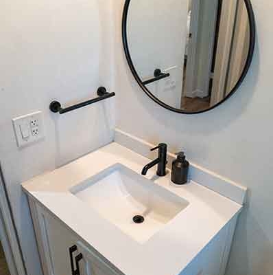 Modern Bathroom Vanity with Matte Black Fixtures in an ADU Modern Bathroom Vanity with Matte Black Fixtures in an ADU